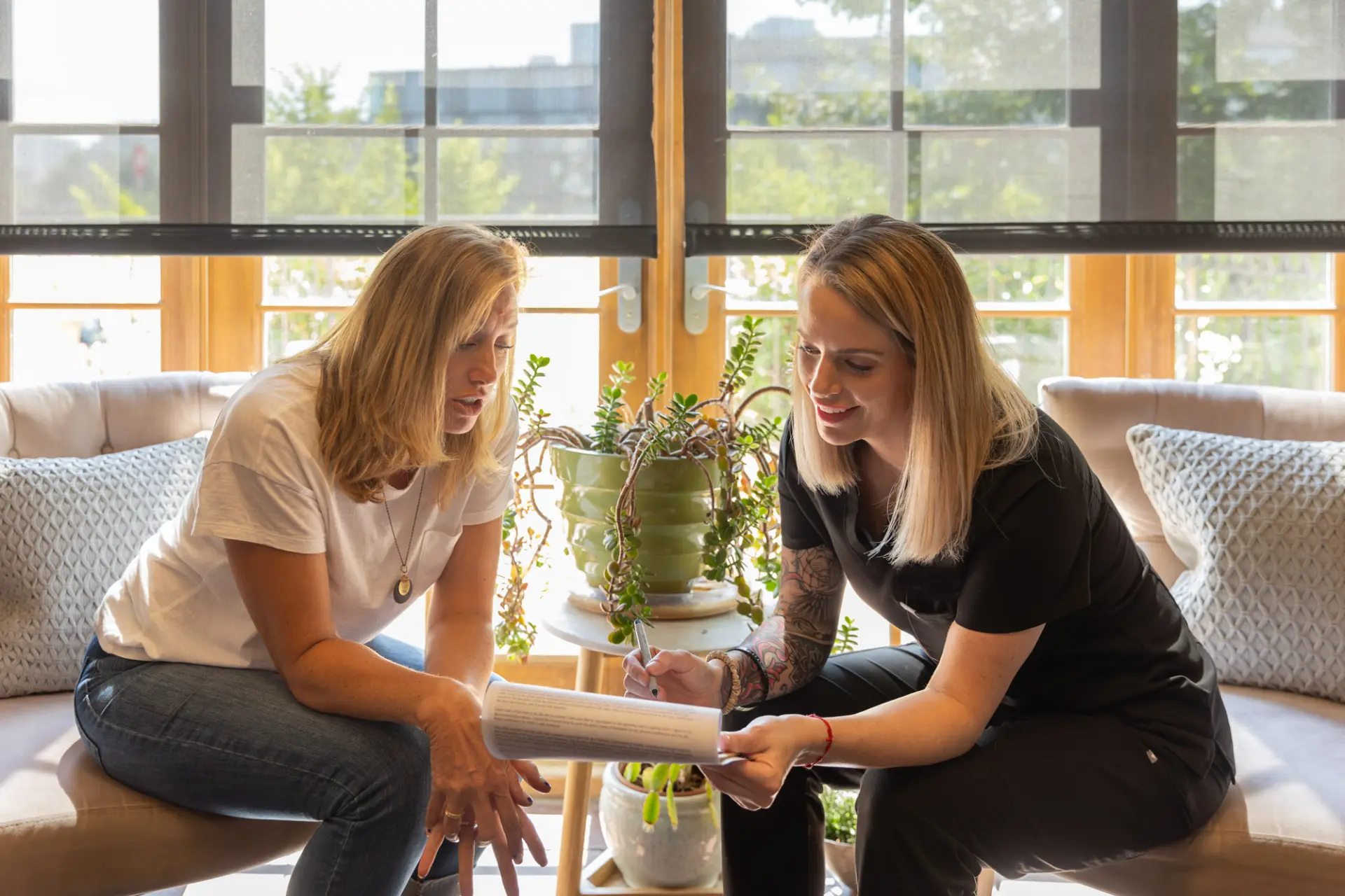 A practitioner reviewing treatment options with a patient